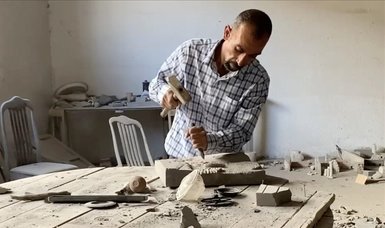 Jordanian artist Tarik Milkawi transforming basalt rocks into works of art