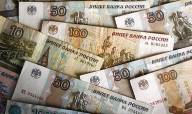 Russian rouble firms to approach four-month high vs dollar