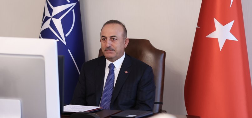 FM ÇAVUŞOĞLU ATTENDS NATO MEETING AHEAD OF LEADERS SUMMIT