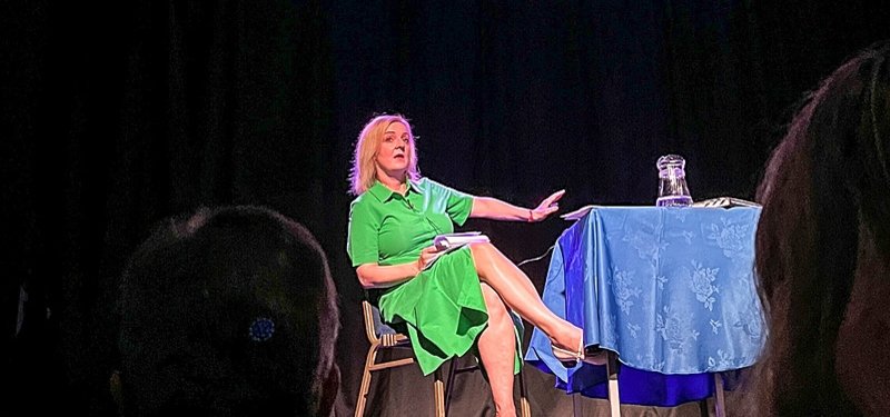 Former British Premier Liz Truss upstaged by prank banner with a side of lettuce