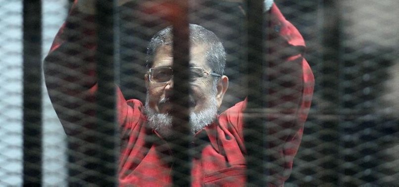 EGYPT’S JAILED PRESIDENT MORSI VOICES REJECTION OF 2013 COUP