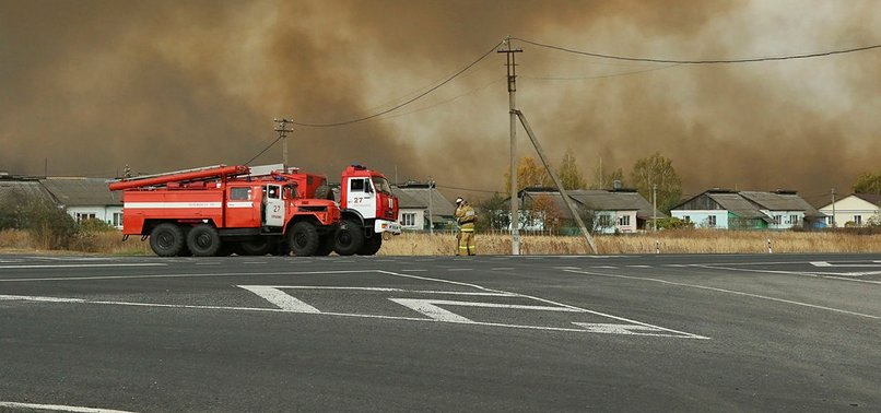 RUSSIA EVACUATES THOUSANDS AS MUNITIONS EXPLODE IN FIRE