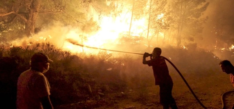 FIREFIGHTERS BATTLING TO CONTAIN WILDFIRES IN SW TURKEY