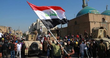 Iraq protesters target southern oil fields as 2 killed in Karbala