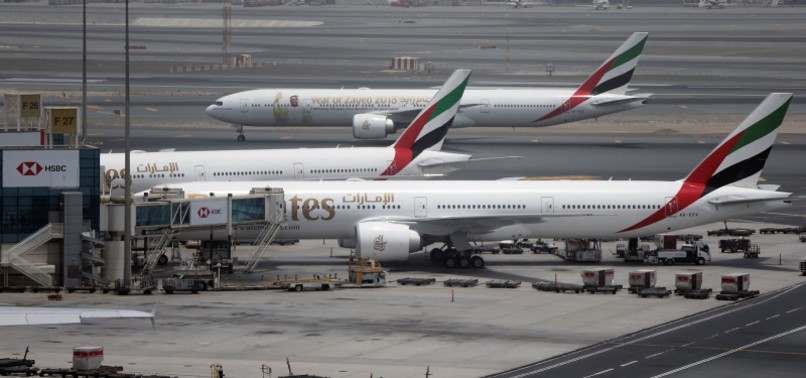 US, EMIRATES SIGN VOLUNTARY DEAL TO RESOLVE AIRLINE SPAT