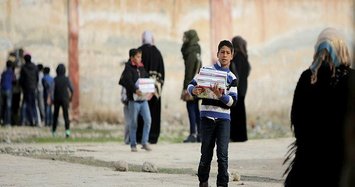 Turkey provides books to 300 students in Tal Abyad