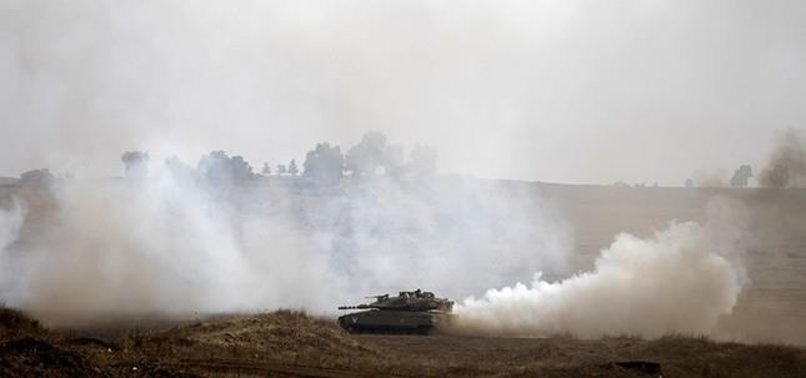 ISRAELI TANKS HIT TARGETS IN SYRIA