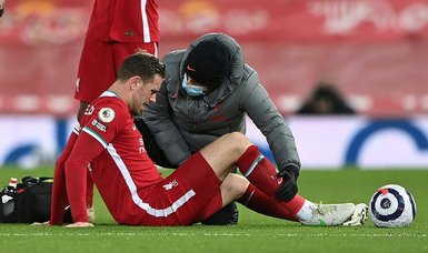 Liverpool's Henderson out until April after surgery