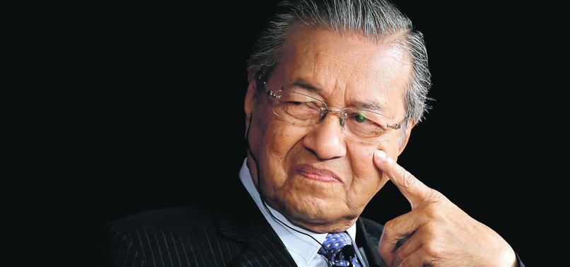 MAHATHIR MOHAMAD SWEARS IN AS MALAYSIA PRIME MINISTER AFTER SHOCK POLL WIN