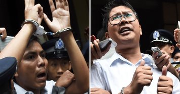 Reuters reporters in jail despite mass pardons in Myanmar
