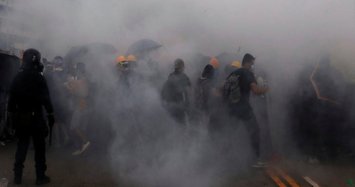 Hong Kong police fire tear gas, water as protest escalates