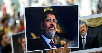 Egypt's Morsi left 'slumped on floor' before death