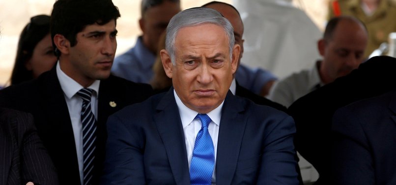 NETANYAHU TO BE CHARGED IN CORRUPTION CASES, PENDING HEARING