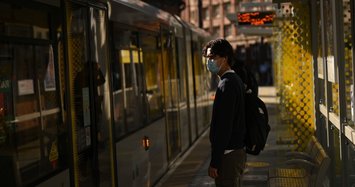 Wear masks in public says WHO, in update of COVID-19 advice