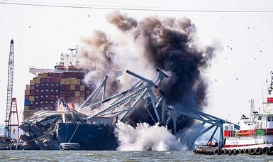 Demolition charges used to free cargo ship from wreckage of bridge in Baltimore