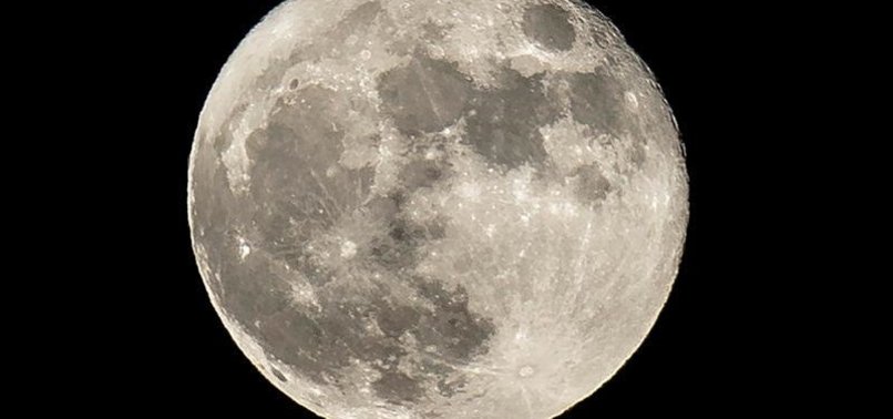 MOON COULD BE WETTER THAN THOUGHT, SAY SCIENTISTS