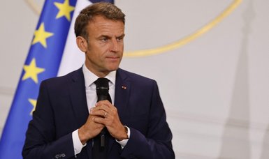 French president faces ire of opposition over call to block social media