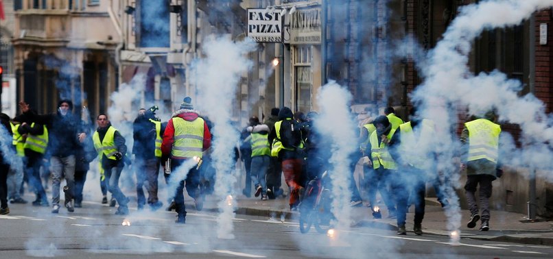 YEARS 1ST YELLOW VEST EVENT IN FRANCE BRINGS TEAR GAS, FIRES