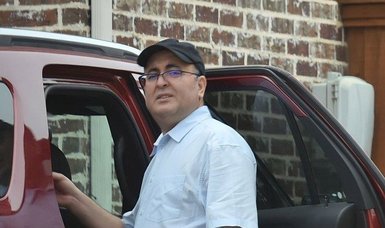 FETO suspect Temel Alsancak, who has been accused of ordering killing of Russian ambassador Karlov, captured on camera in USA