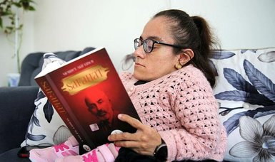 Turkish woman Tuğba Fidan struggling with glass bone disease finds solace in reading
