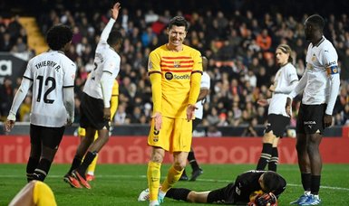 Defending champions Barcelona held to 1-1 draw at Valencia