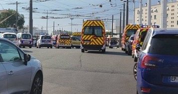 Knife attack kills 1, injures 9 near Lyon; suspect detained