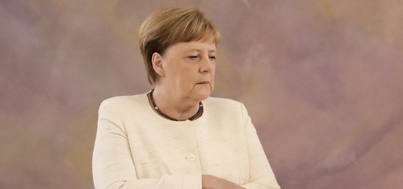 IM DOING WELL, MERKEL SAYS AFTER SECOND PUBLIC SHAKING BOUT