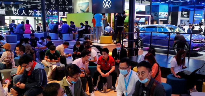 CROWDS IN FACE MASKS PACK OUT CHINA AUTO SHOW AFTER VIRUS DELAY