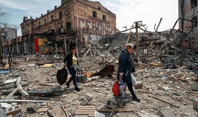 Residents of captured Ukrainian port city of Mariupol try to survive among its ruins