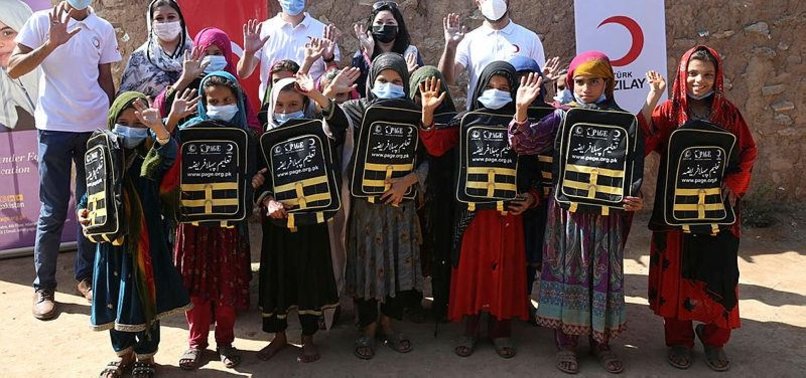 TURKISH RED CRESCENT HANDS OUT SCHOOL SUPPLIES TO AFGHAN REFUGEE CHILDREN IN ISLAMABAD