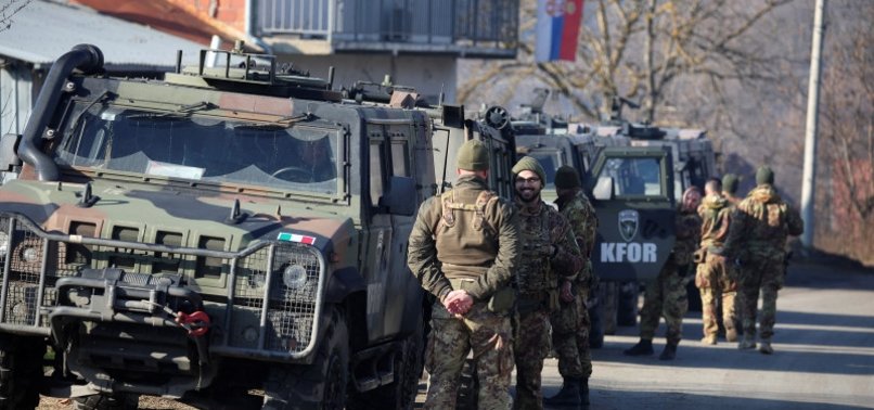 MILITANT SERBS ERECT BARRICADE IN DIVIDED CITY OF MITROVICA IN KOSOVO