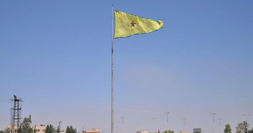 YPG/PKK replaces flag with new one in Syria’s Tal Abyad