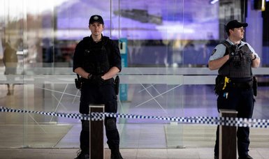 Australian charged with shooting at windows inside Canberra airport
