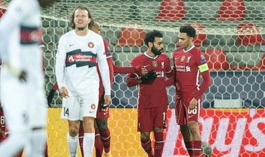 Mohamed Salah sets club record as Liverpool held at Midtjylland