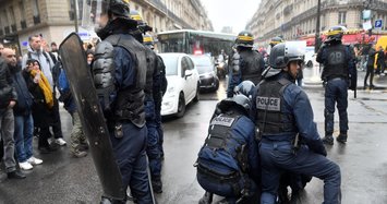 French police use tear gas to end protest over pension reform