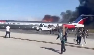 Passenger jet catches fire while landing at Miami airport