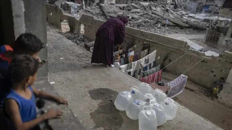 Displaced Gaza families struggle in tents near damaged Islamic University