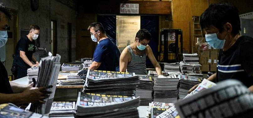 HONG KONG DEMOCRACY PAPER RUNS DEFIANT EDITION DAY AFTER RAID