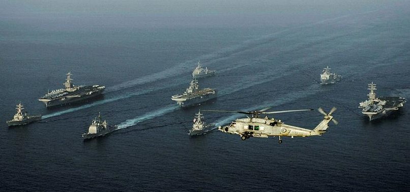IRAN SAYS IT WARNED OFF US SHIP, NAVY DENIES IT