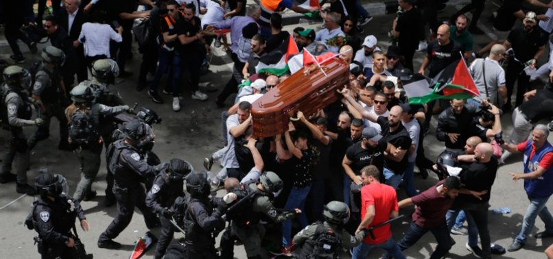 IRISH FOREIGN MINISTER SHOCKED BY IMAGES FROM PALESTINIAN JOURNALISTS FUNERAL PROCESSION