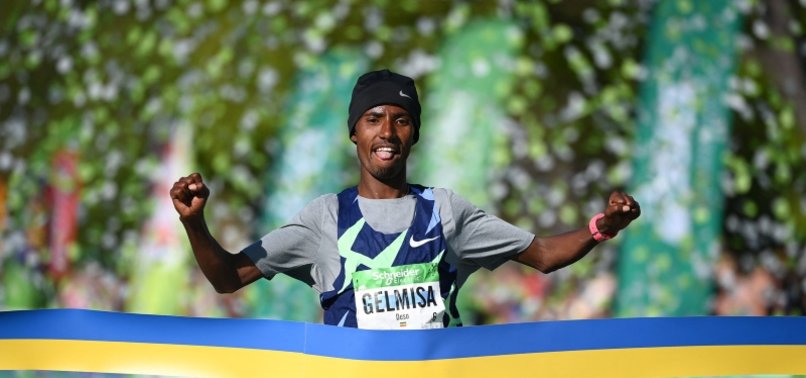ETHIOPIAS GELMISA WINS PARIS MARATHON, KENYAN JEPTUM SETS COURSE RECORD