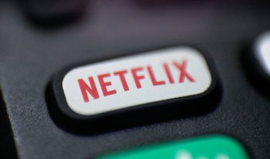 Netflix aims to curtail password sharing and bring in ads