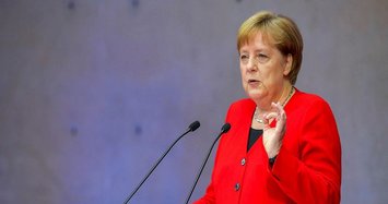 Merkel urges equal opportunity for immigrants