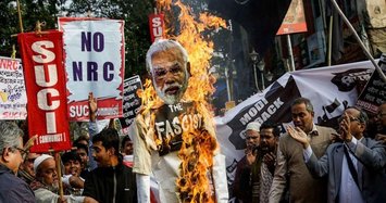 Indian farmers threaten to burn Trump, Modi effigy