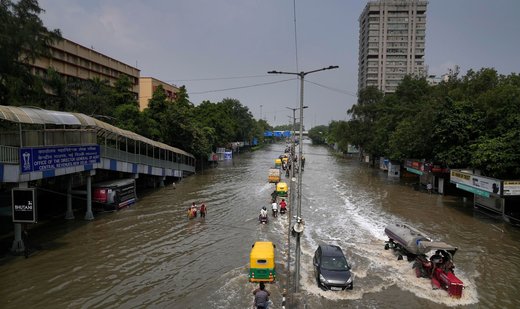 Heavy rain, extreme heat battle Asia