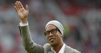 Former Brazilian star Ronaldinho retires from football