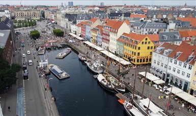 Deaths spike as Denmark battles 'triple epidemic'