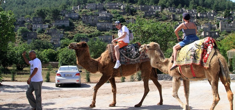 GHOST TOWN TOUR ON CAMELS IN KAYAKÖY VILLAGE