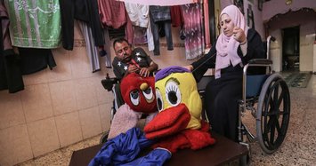 Disabled Gaza couple make dolls to give their children 'decent life'