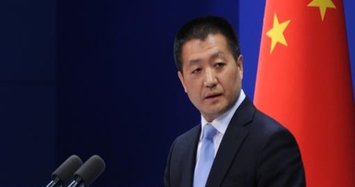 China 'regrets' US leaving postal union amid trade dispute